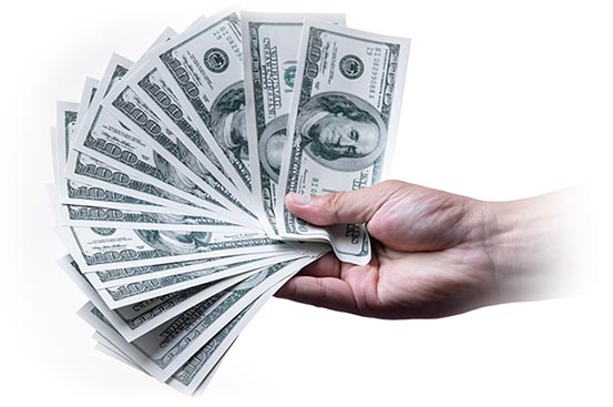 image of cash for used copiers - hand holding money